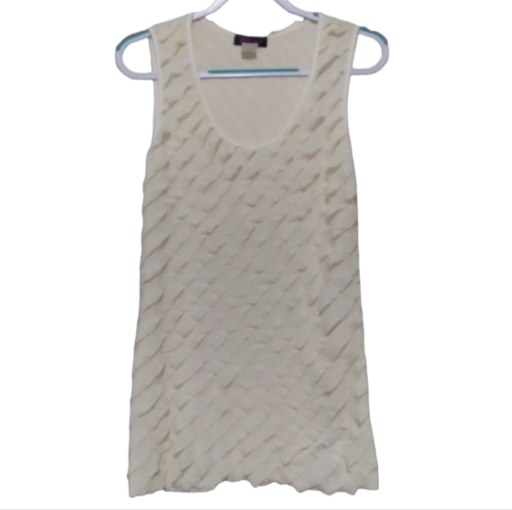 | Cream color ruffled tank top
